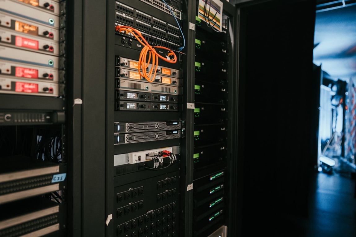 Rows of glowing server racks in a modern cloud data center