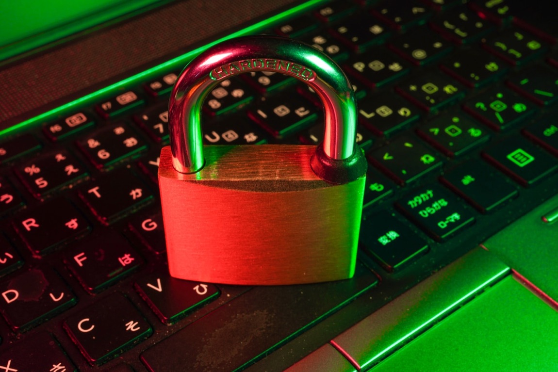 A sturdy metal padlock representing GitHub App permissions and webhook secrets